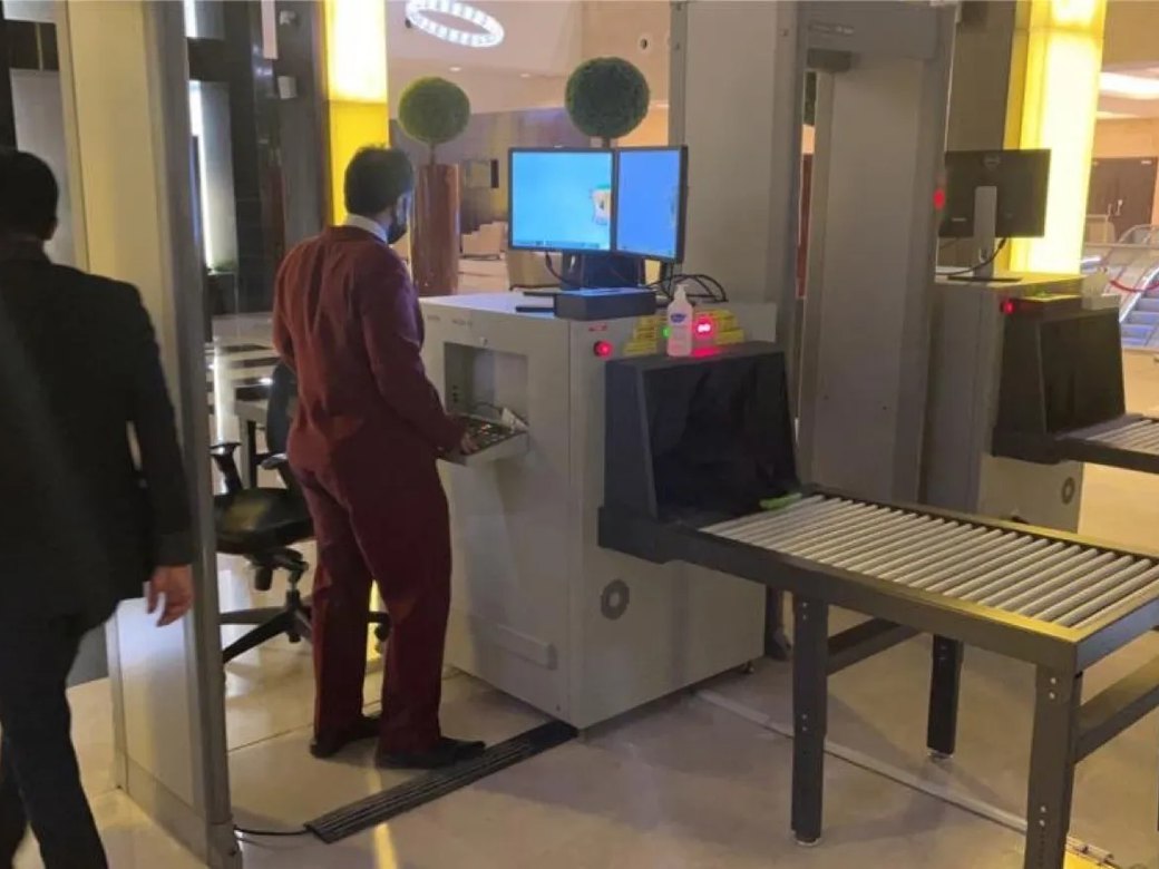 Security screening checkpoint at a facility entrance