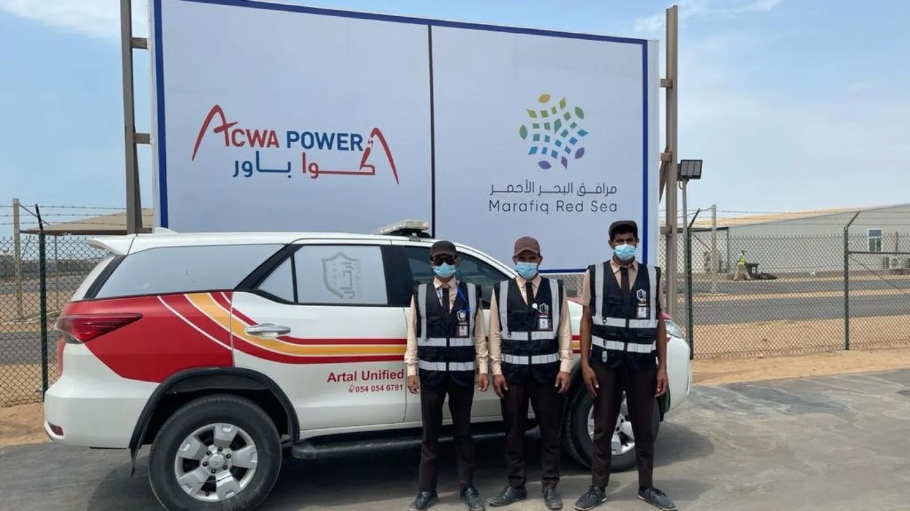 Artal security team with patrol vehicle at an industrial energy site